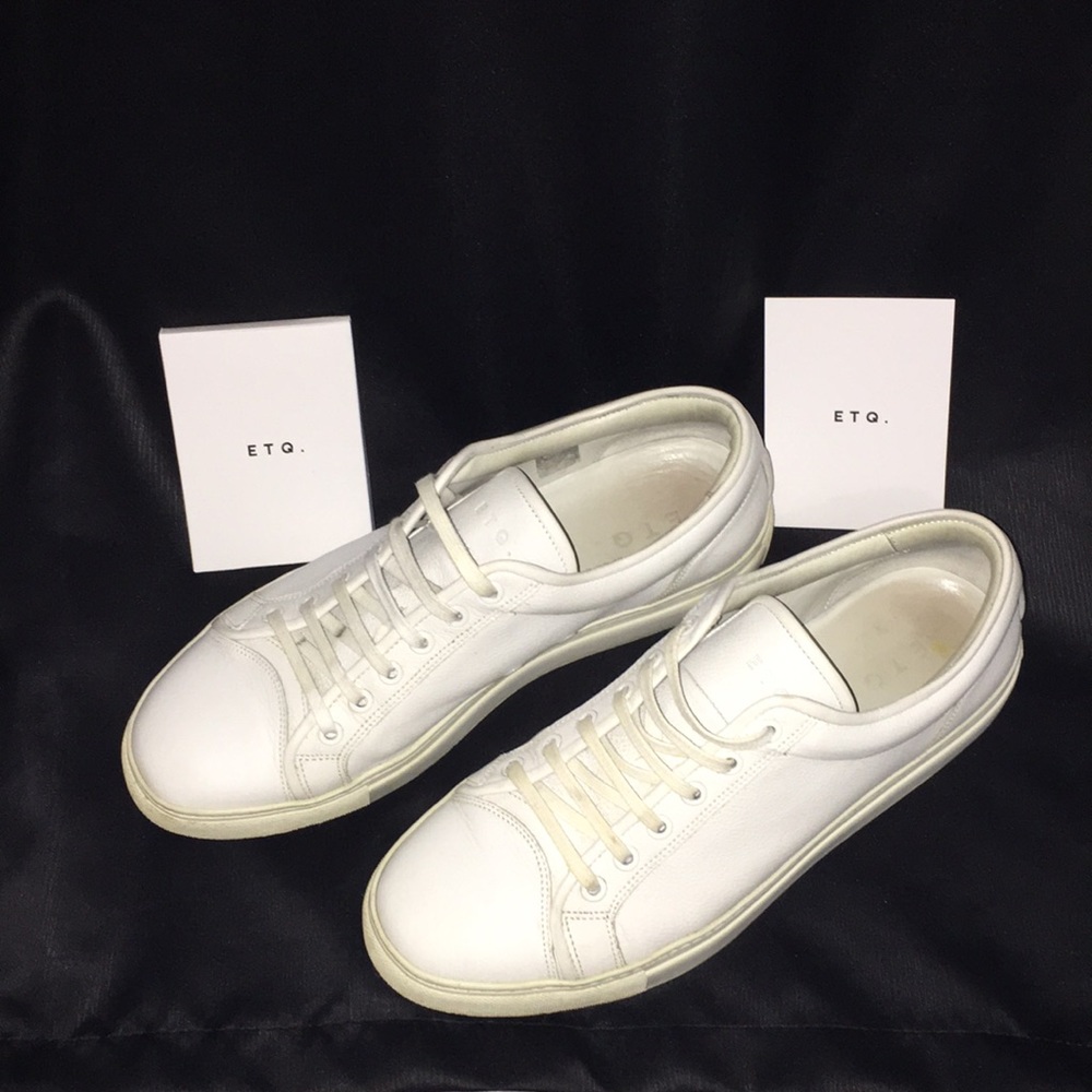 ETQ white sneakers.